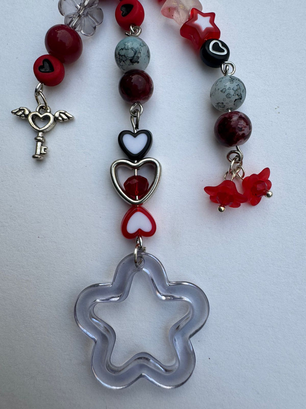 Reddish Black Star Keychain