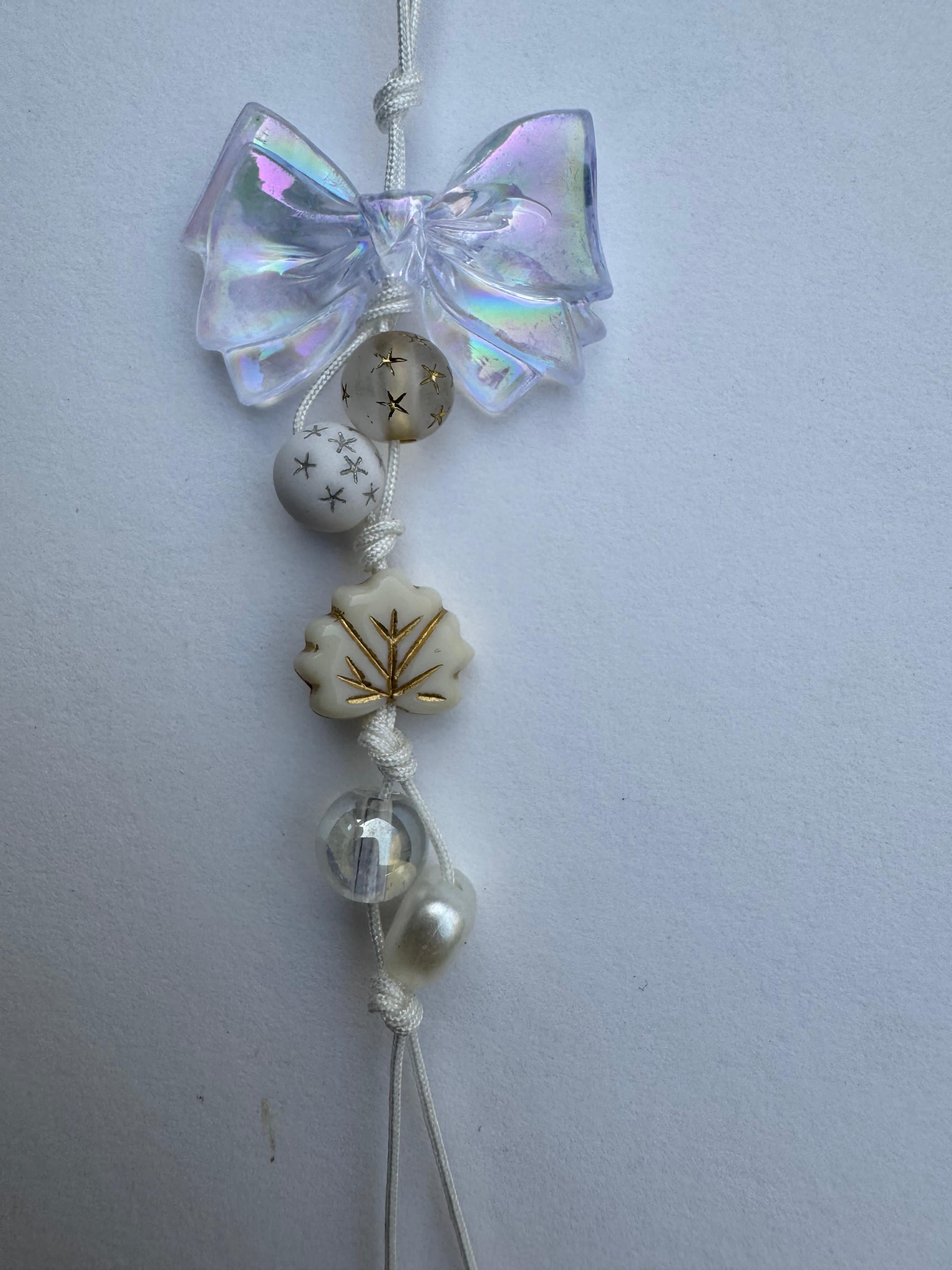 White Bow And Flower Charm