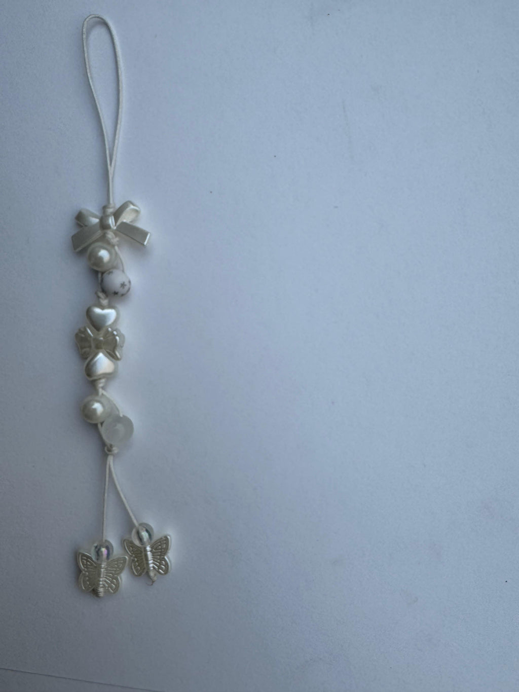 White Flotal Bow Charm