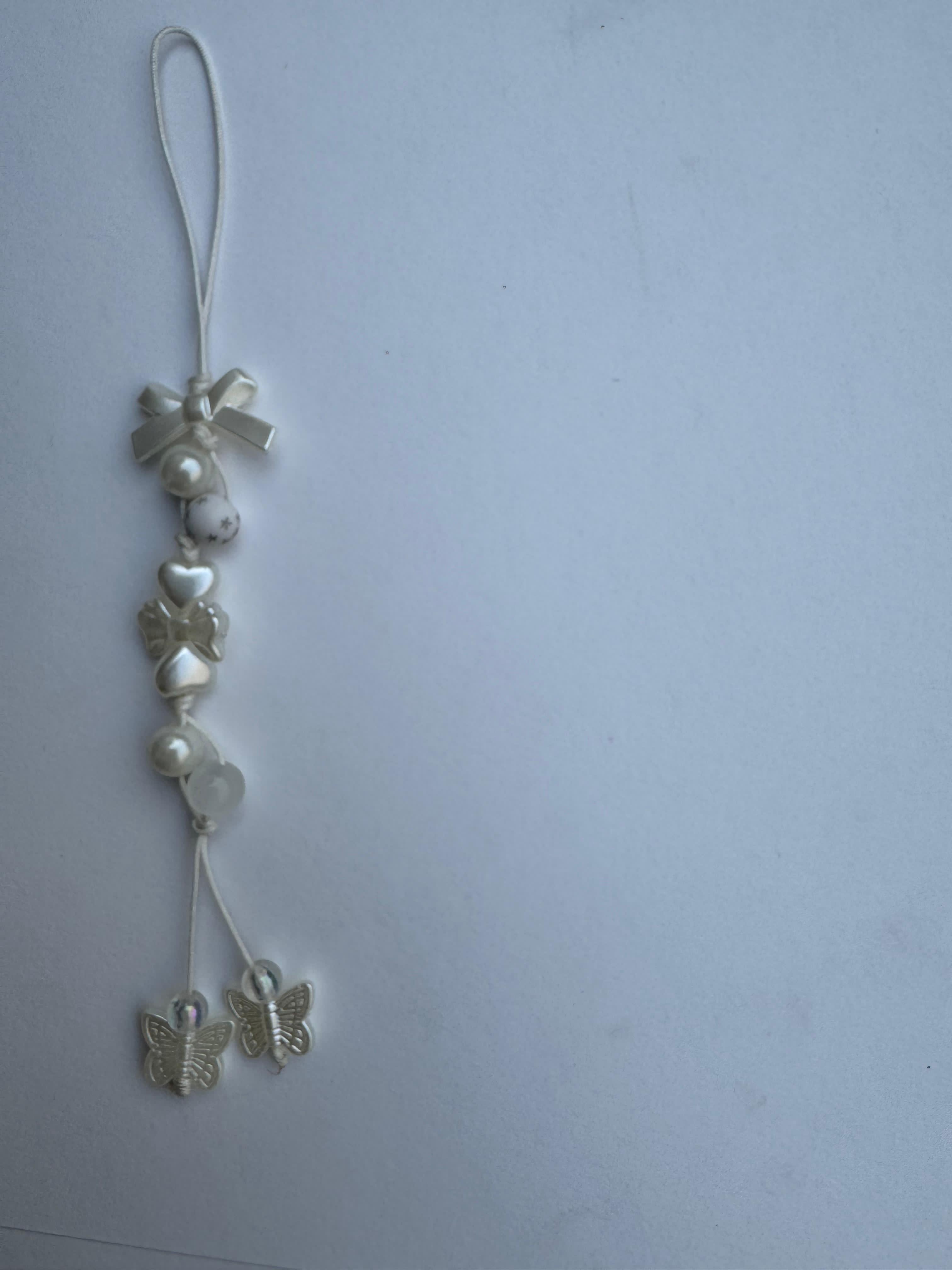White Flotal Bow Charm