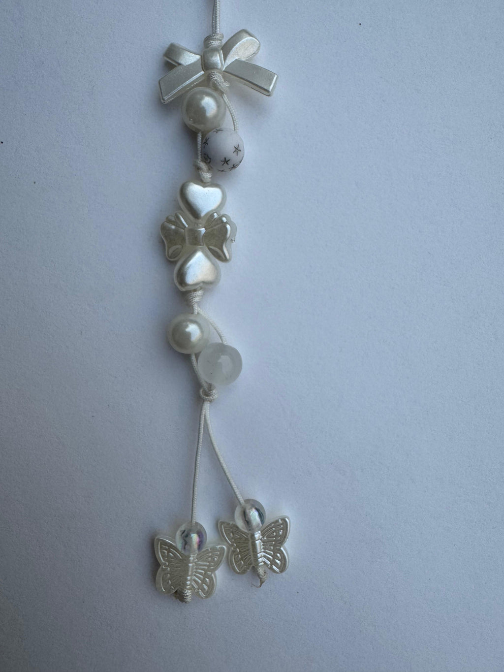 White Flotal Bow Charm
